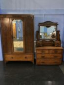 An oak wardrobe and a dressing chest