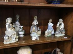 Five Lladro figures and a Nao figure (6)