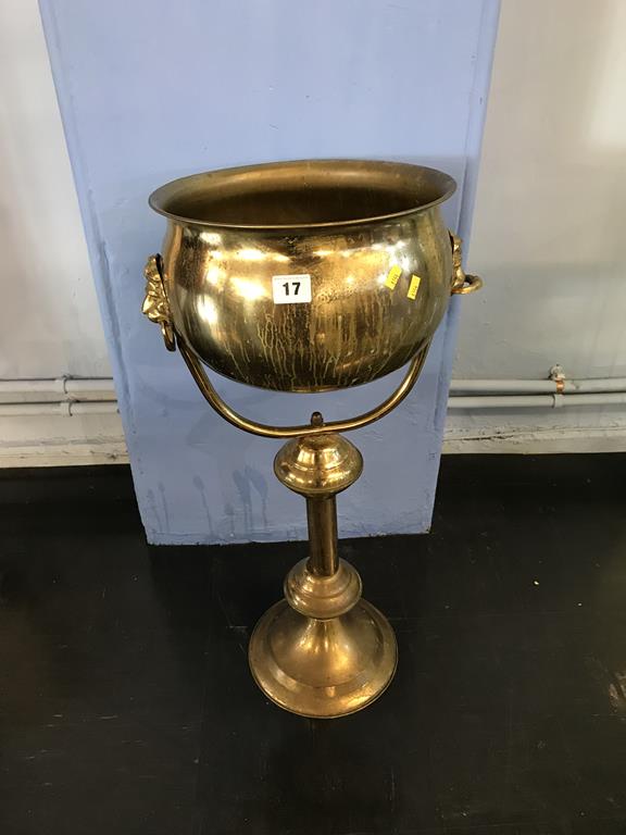 A brass jardinere and stand