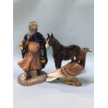 A Royal Doulton 'Good King Wenceslas', a Beswick pigeon and a horse