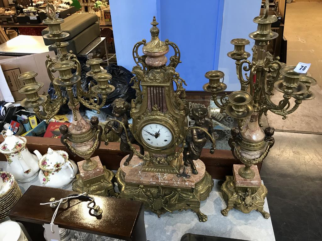 A large decorative clock garniture