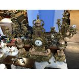 A large decorative clock garniture