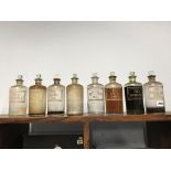 Eight Chemist's bottles