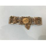 A Sovereign, dated 1897, mounted in a 9ct gold bracelet, 25.5g total