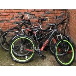 Four various mountain bikes