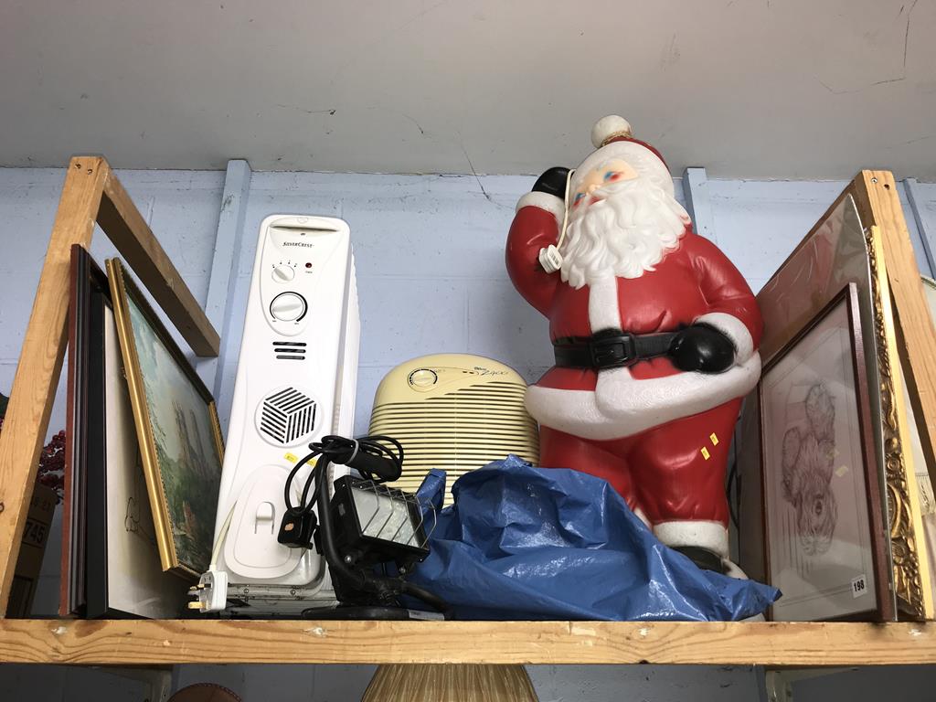 A shelf of assorted, to include illuminated Santa Claus