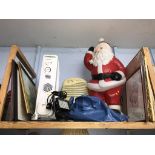 A shelf of assorted, to include illuminated Santa Claus
