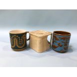 A George Clews 'Cunard White Star' cube water pot and two Hornsea pottery mugs, the Nessie mug