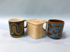 A George Clews 'Cunard White Star' cube water pot and two Hornsea pottery mugs, the Nessie mug