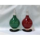 Two plastic display chemist bottles