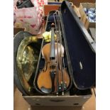 A violin, pewter chargers etc.