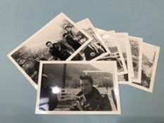 A collection of eight previously unseen black and white photographs of Elvis Presley on the set of