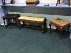 A piano stool, one other and a carved oak occasional table