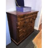 A walnut scotch chest of drawers