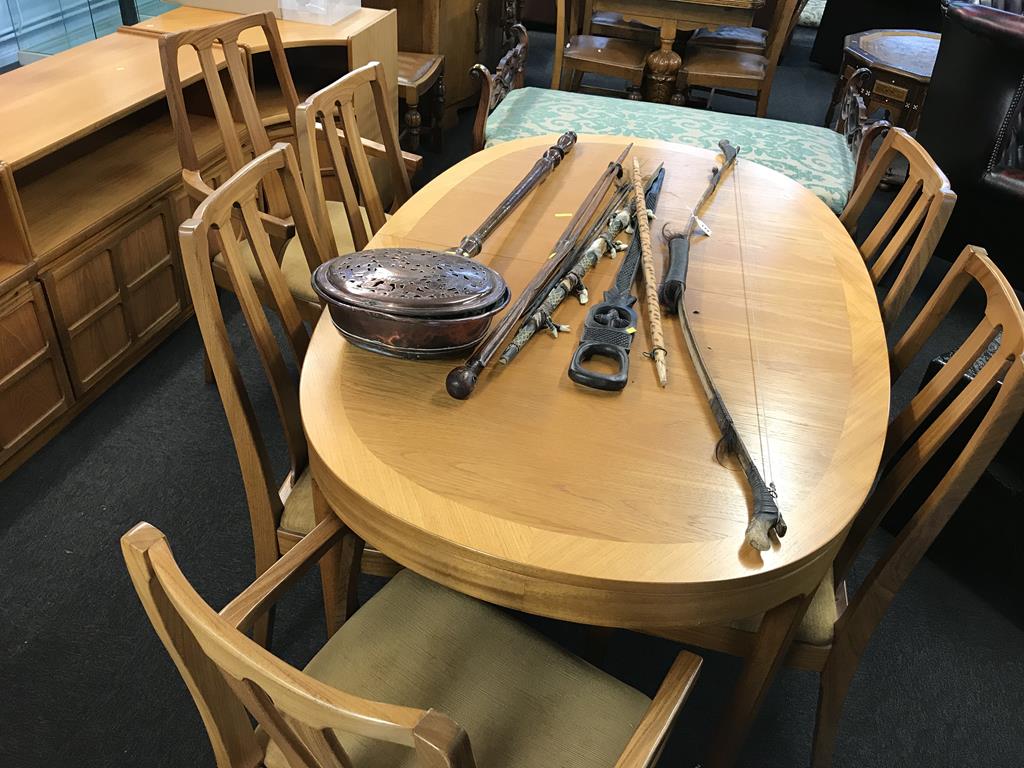 A teak extending dining table and six chairs, three matching units, together with an oak sliding - Image 2 of 4