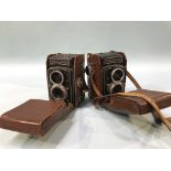 Two Rolleiflex cameras