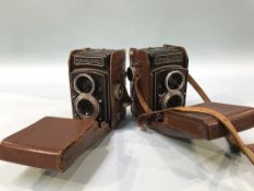 Two Rolleiflex cameras