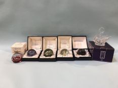 Fived boxed Caithness paperweights and an Edinburgh Crystal swan