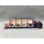 Fived boxed Caithness paperweights and an Edinburgh Crystal swan