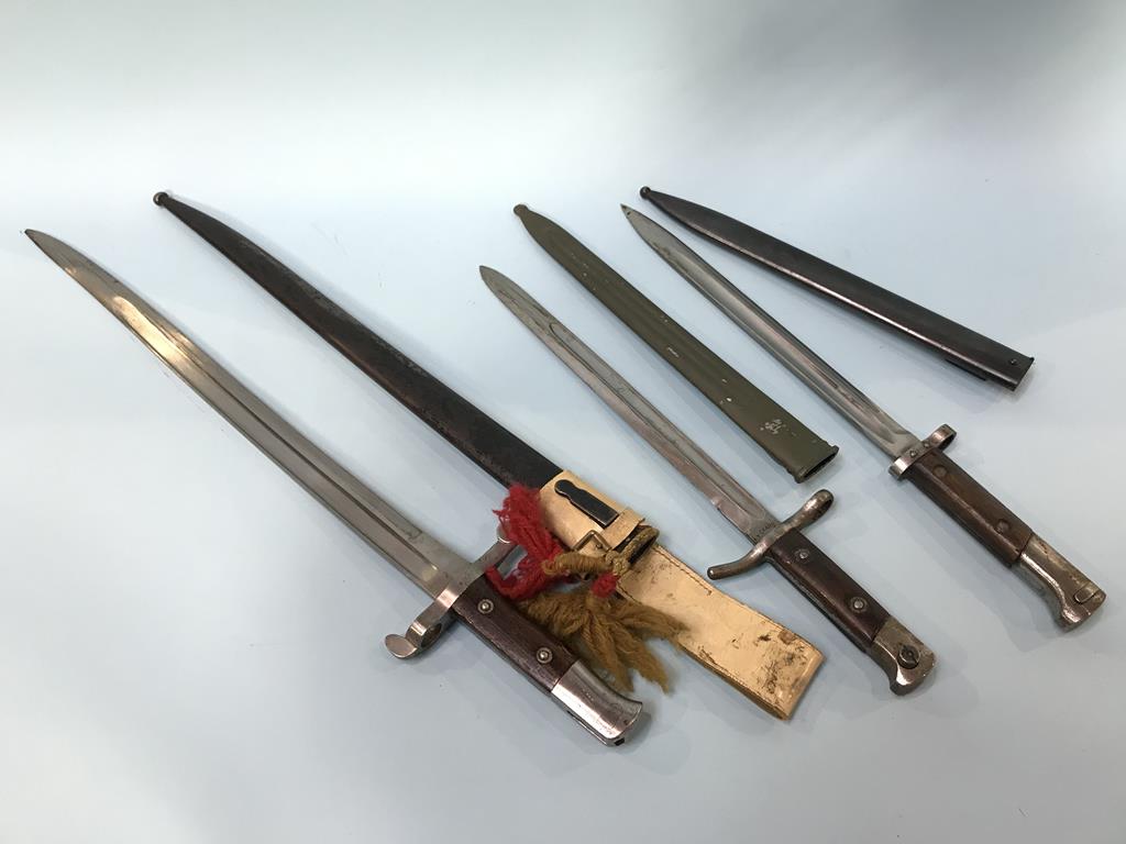 Three various bayonets