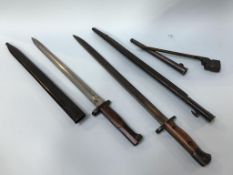 Three various bayonets