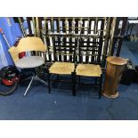 A coat stand, swivel chair and a pair of ebonised chairs etc.