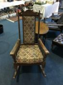 An Old Charm oak rocking chair
