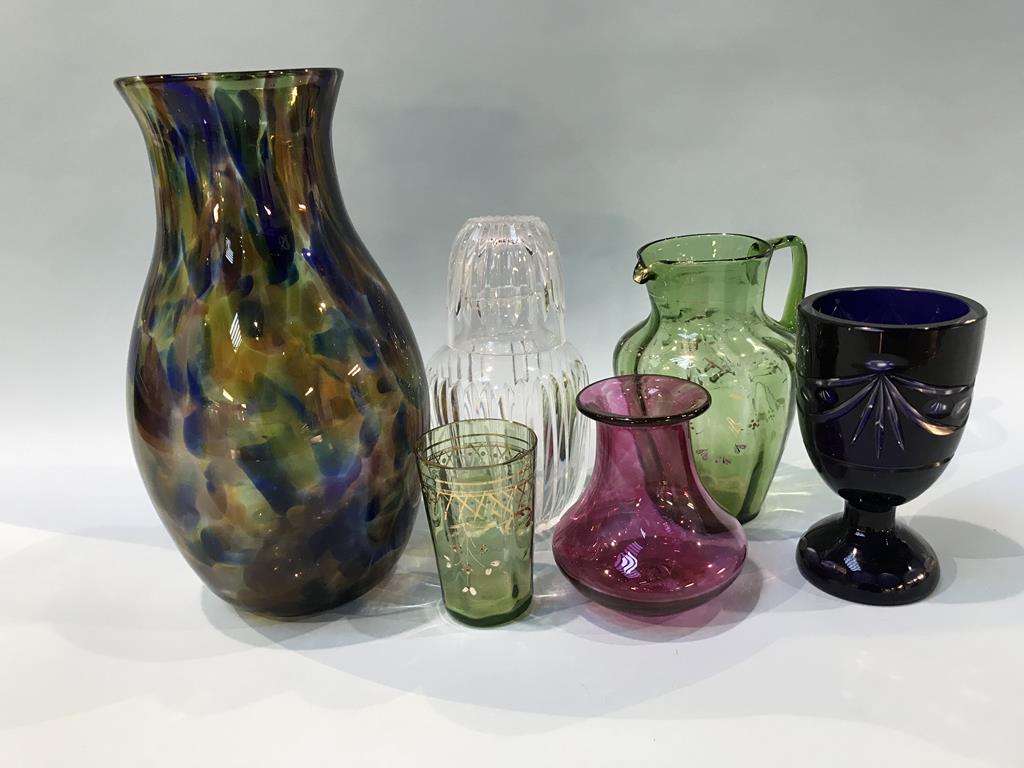 A quantity of coloured glassware