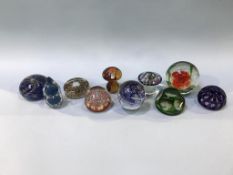 Ten various glass paperweights