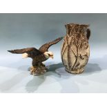 A Beswick 'Bald Eagle' and a water jug