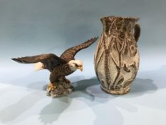 A Beswick 'Bald Eagle' and a water jug