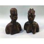 Two carved tribal busts