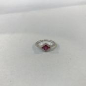 A 9ct gold, ruby and diamond fancy cluster ring