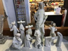 A selection of Lladro and Nao figures