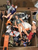 A box of Action Man figures