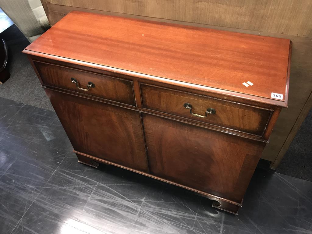 A mahogany two door cabinet