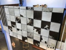 A Ralph Lauren patchwork cow hide 'Douglas' design floor rug, labelled, (cost £4000), 8ft x 10ft
