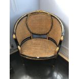 A Regency style bergère double canework tub chair