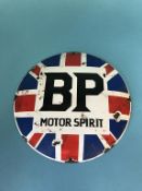 An enamel circular convex 'BP Motor Spirit', wall mounted sign, 30cm diameter