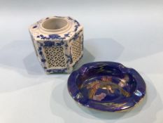 A Maling ashtray and a Chinese blue and white brush pot, with pierced fretwork and an octagonal