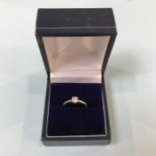 A platinum diamond solitaire ring, 2.7g, size 'J'