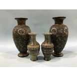 A pair of Doulton Lambeth Slaters Patent vases and a smaller pair of stoneware vases, 36cm height
