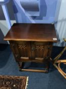 An Old Charm oak linenfold cabinet