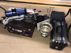 A telescope, wine cooler and various wristwatches