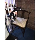 An Edwardian corner chair