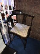 An Edwardian corner chair