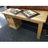 A pine desk and dressing table