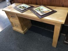 A pine desk and dressing table