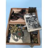 A box of various cap and shoulder badges and buttons etc.