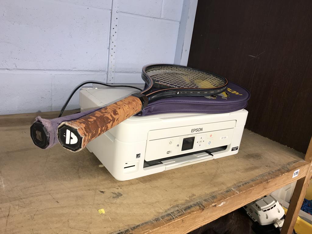 A printer and tennis racquets